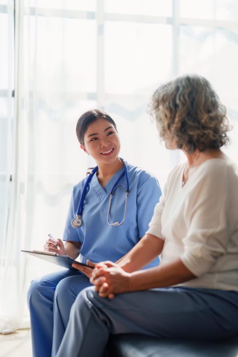 Home healthcare nurse, physical therapy with senior adult woman at home Home healthcare nurse, physical therapy with senior adult woman at home.
